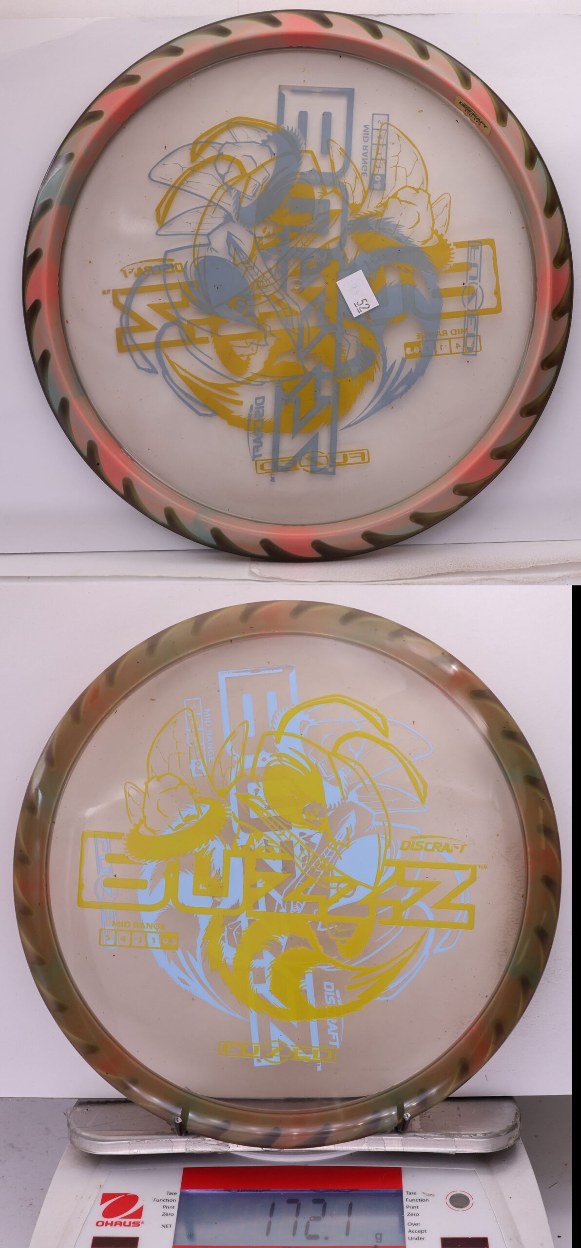 756362 X-Out Fuzed Line Buzzz - Buzzzsaw - #52 Clearish-TanOrngBlu, 172