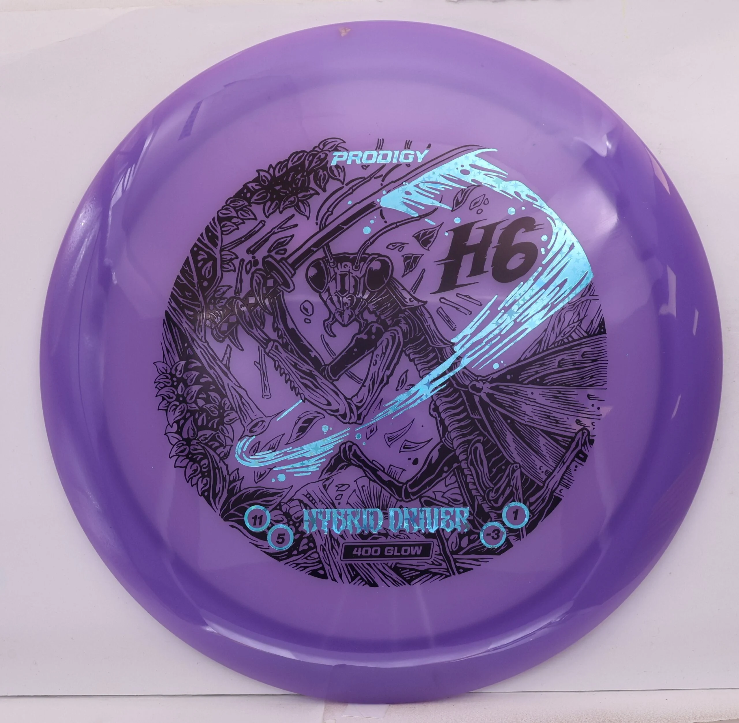 Prodigy H6, 400 Glow Slasher Stamp • Marshall Street Disc Golf