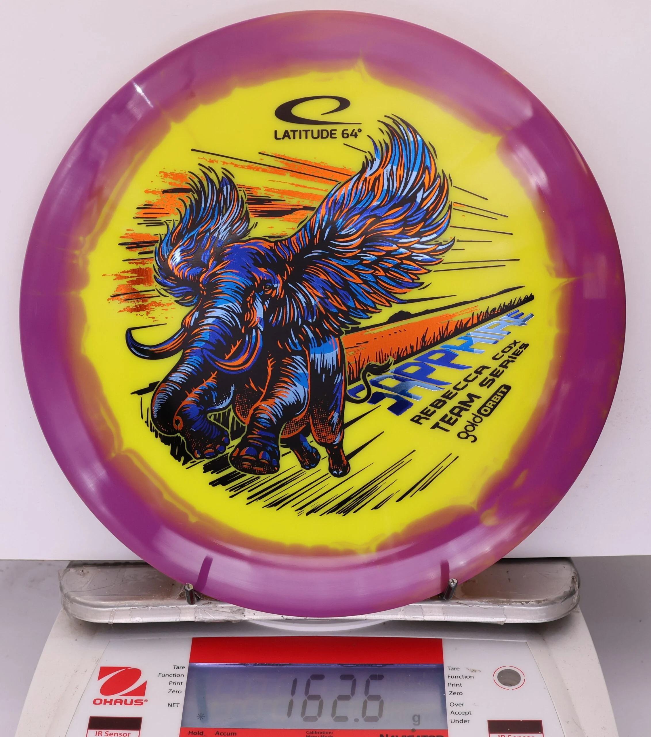 896093 Gold Orbit Sapphire, Rebecca Cox 2026 Team Series - #06 Purple-Yellow, 163