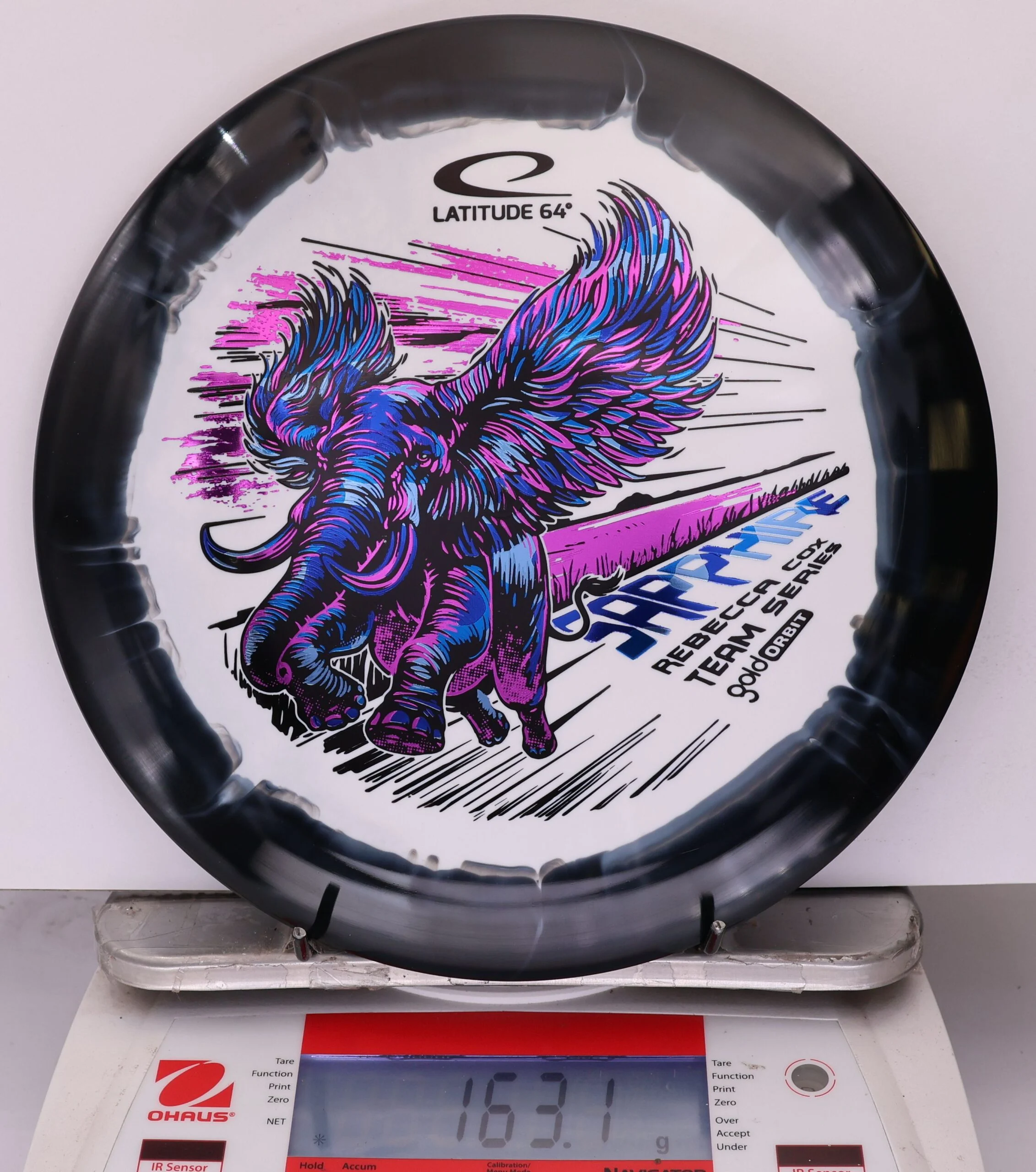 896141 Gold Orbit Sapphire, Rebecca Cox 2026 Team Series - #16 Black-White, 163