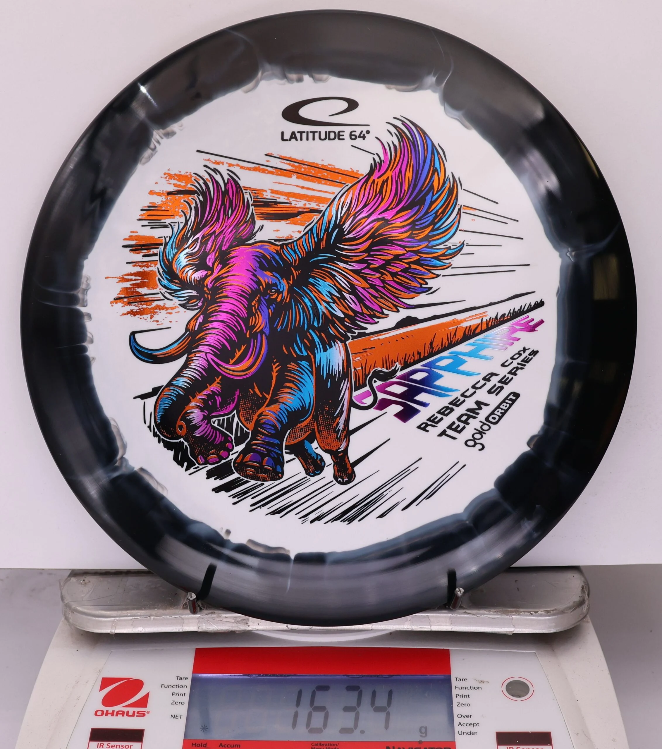 896163 Gold Orbit Sapphire, Rebecca Cox 2026 Team Series - #19 Black-White, 163