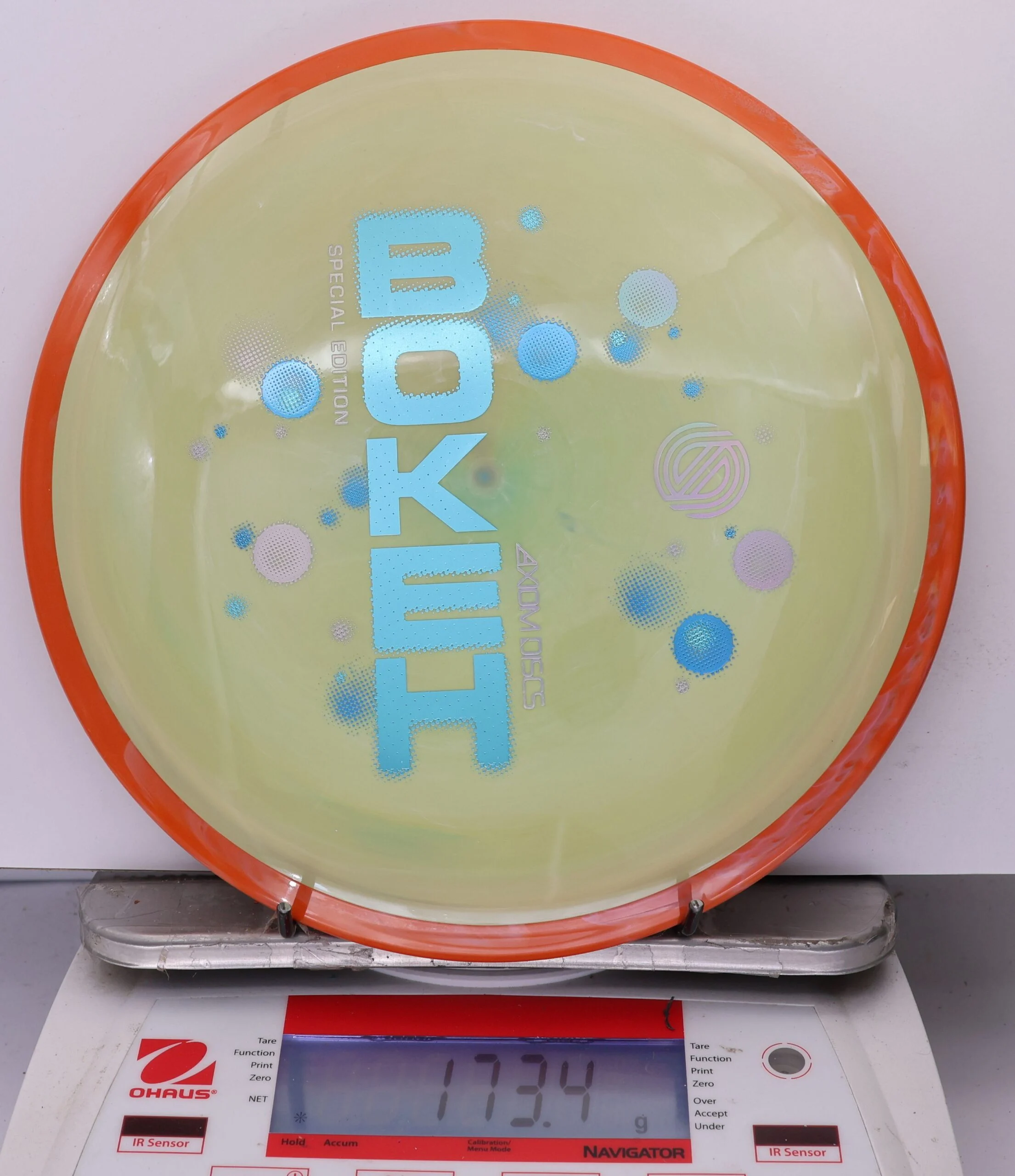 987163 Simon Line Neutron Bokeh, Special Edition - #472 Orange-PeaGreen, 173