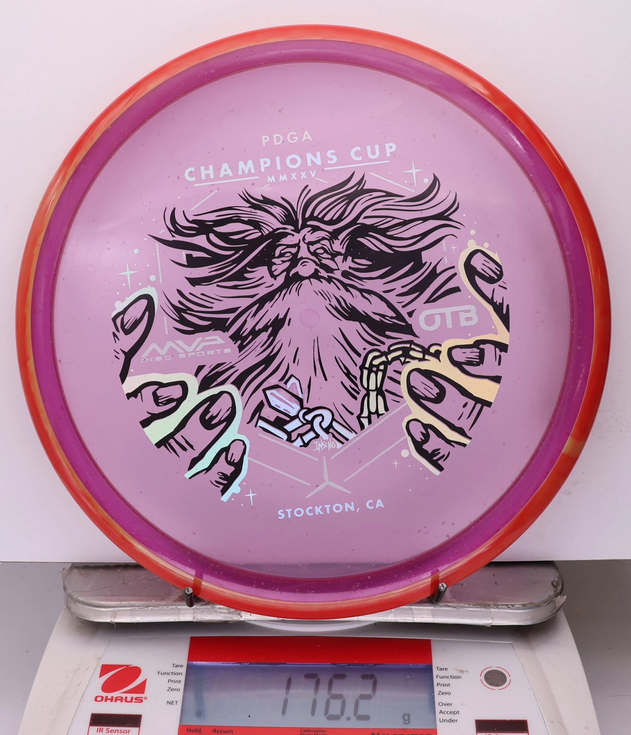 1039025 Particle Glow Proton Hex, PDGA Champions Cup 2025 - #371 Red-Purple, 176