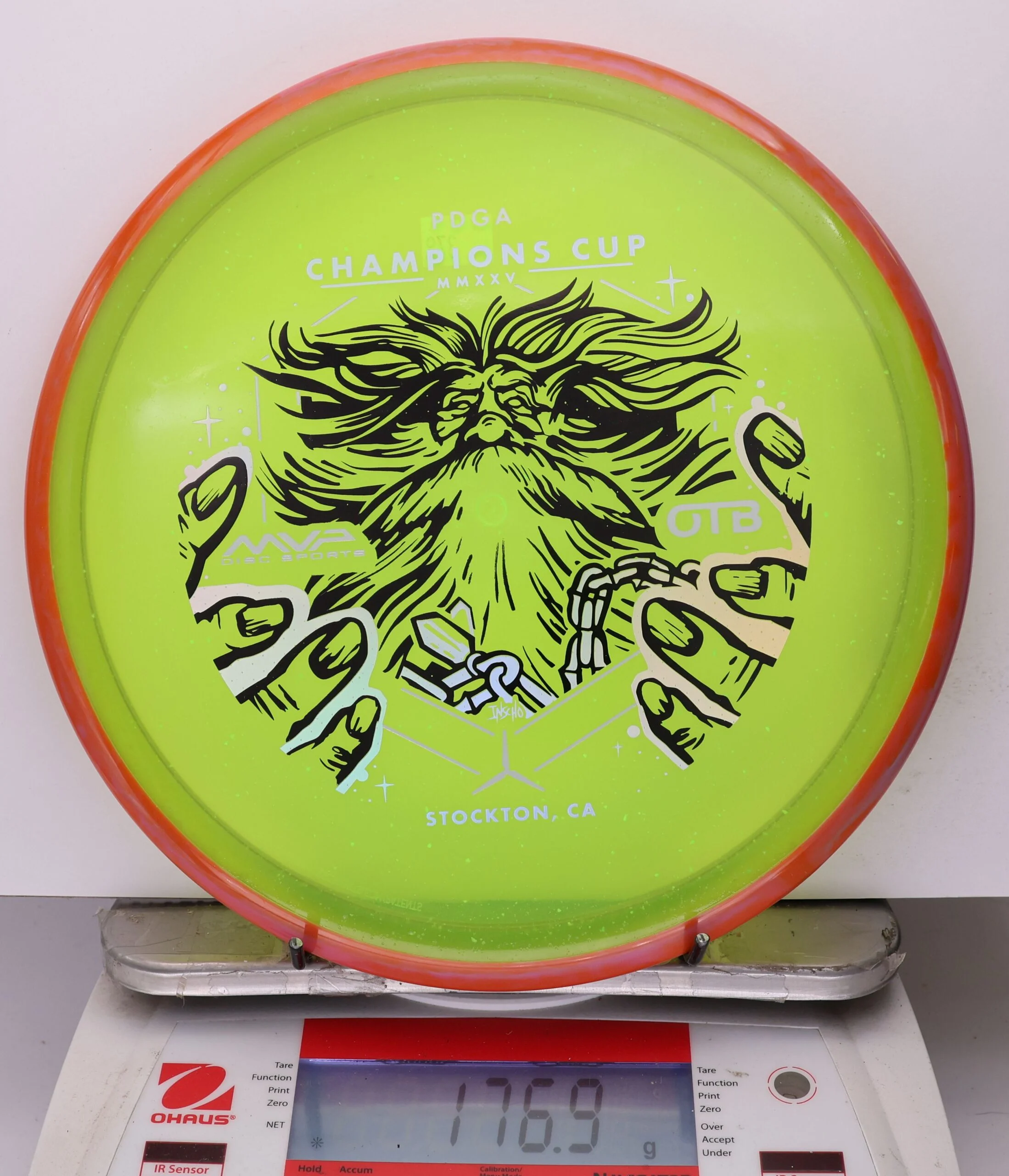 1039048 Particle Glow Proton Hex, PDGA Champions Cup 2025 - #379 RedOrange-Grellow, 177