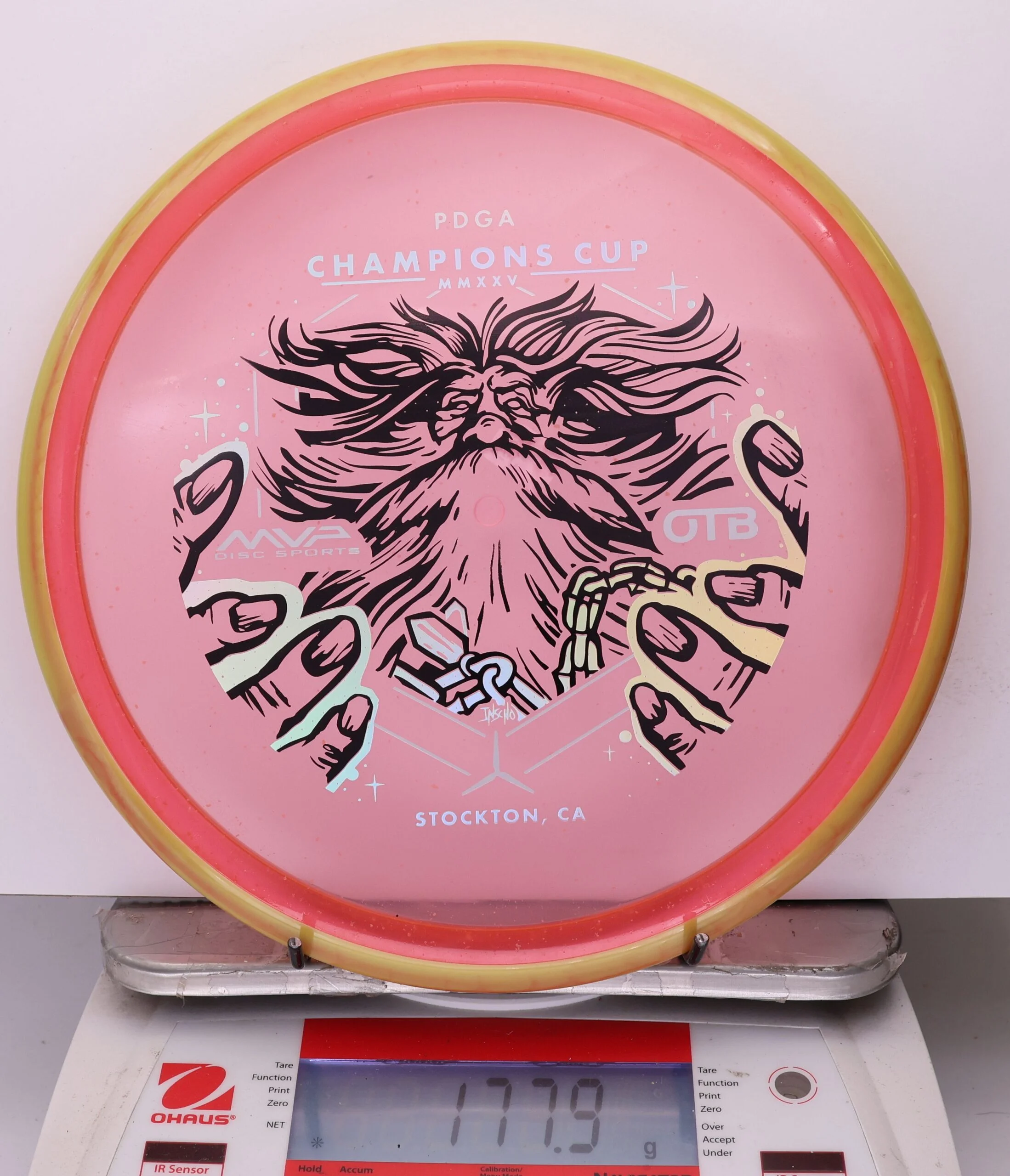 1039085 Particle Glow Proton Hex, PDGA Champions Cup 2025 - #386 OrangeYellow-Pink, 178
