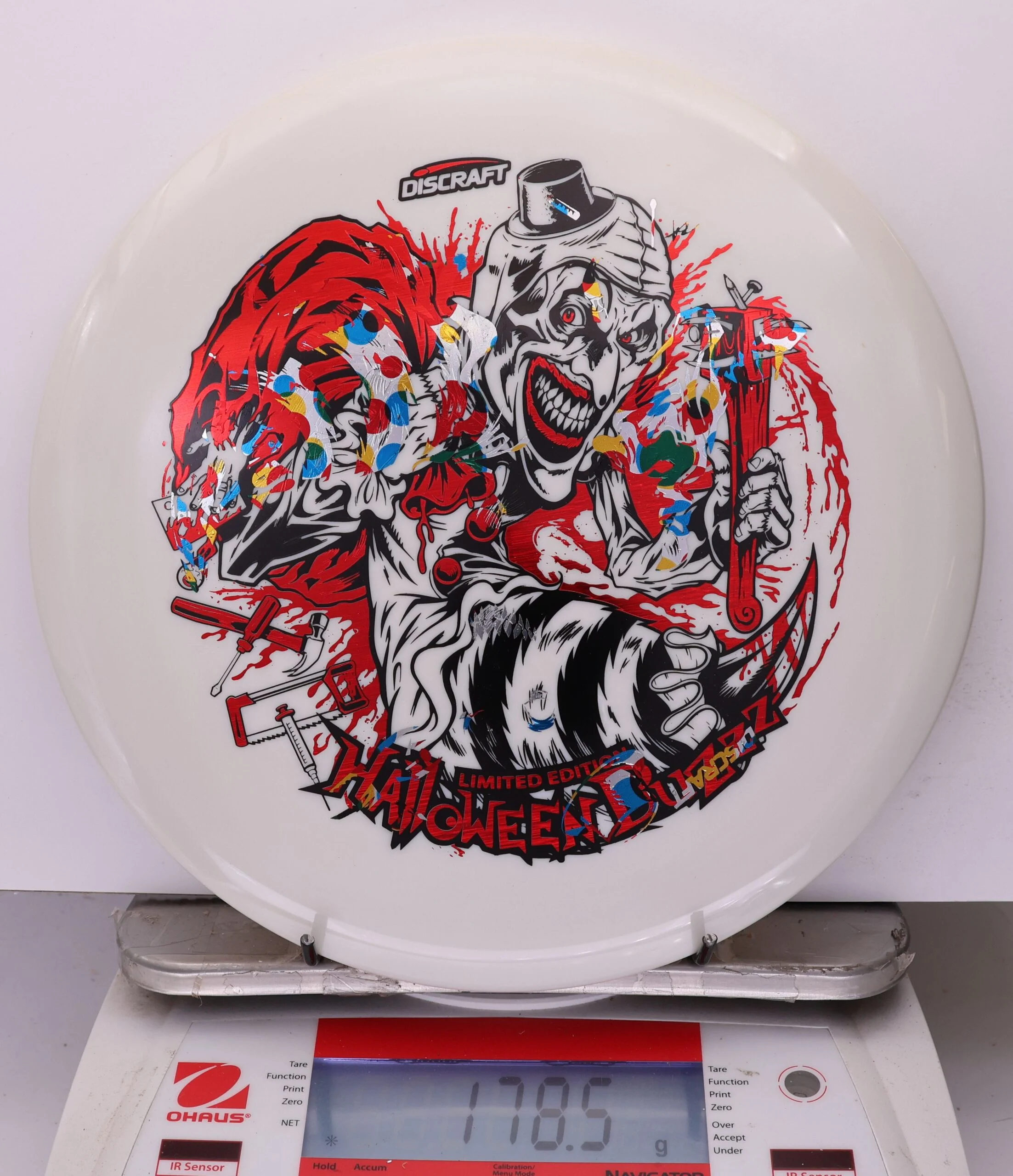 1040987 X-Out Glow ESP Buzzz, Tri-Foil - Halloween Edition 2025 - #422 White, 179