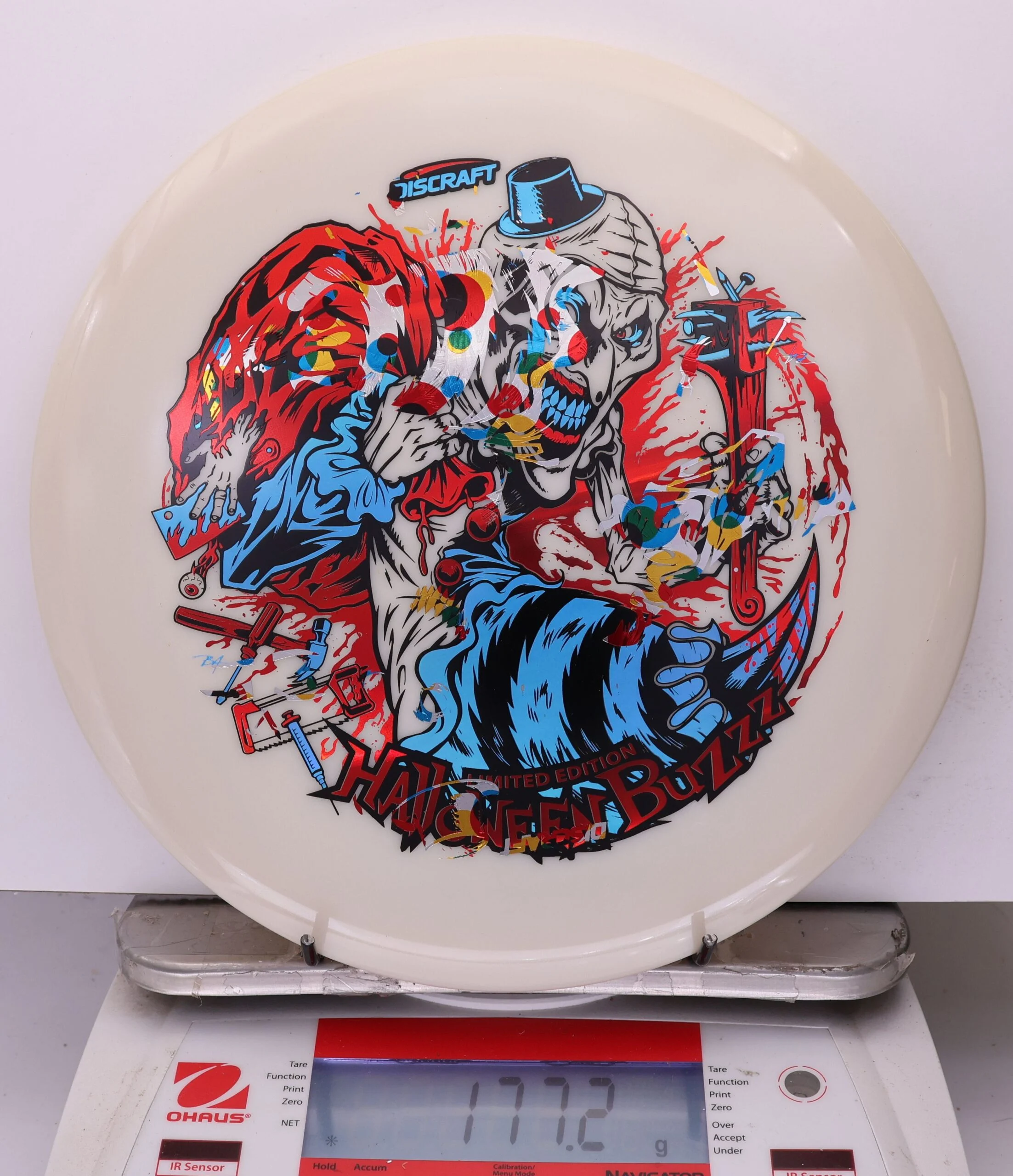 1041039 X-Out Glow ESP Buzzz, Tri-Foil - Halloween Edition 2025 - #432 White, 177