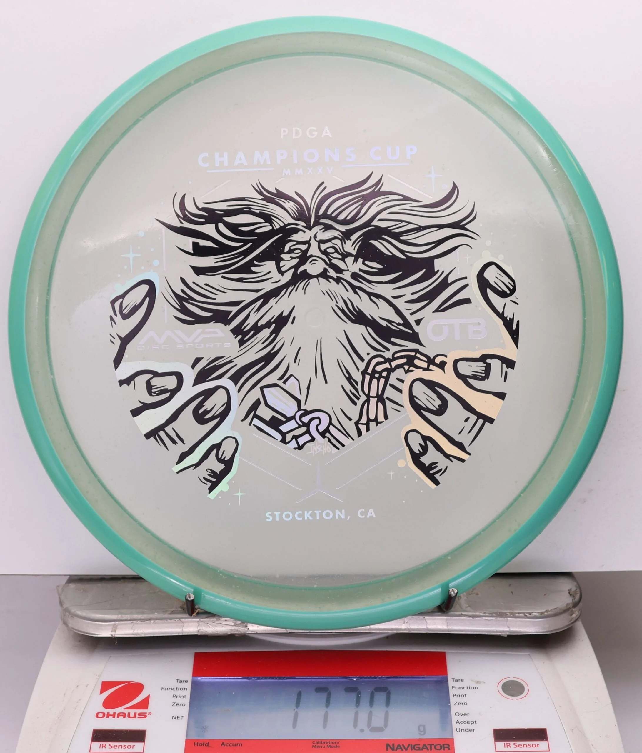1173425 Particle Glow Proton Hex, PDGA Champions Cup 2025 - #379 Aqua-Clear, 177