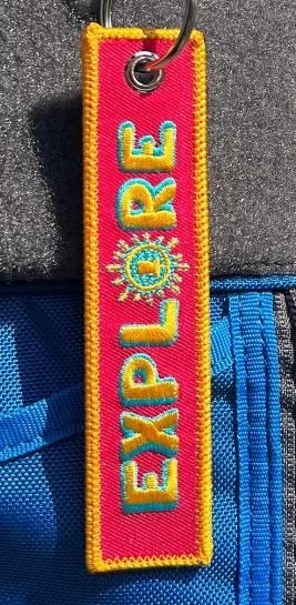 1187648 Explore Your World Disc Golf Fabric Keychain® - Pink Yellow