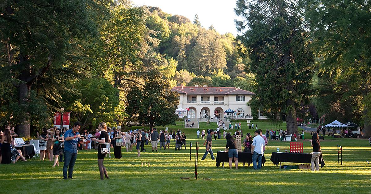 Image: A diverse crowd of people gathers on the Great Lawn at Montalvo. Photo: Bahara Emami
