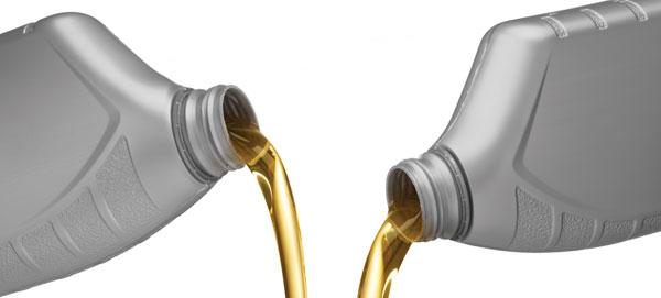 pouring engine oil pouring engine oil