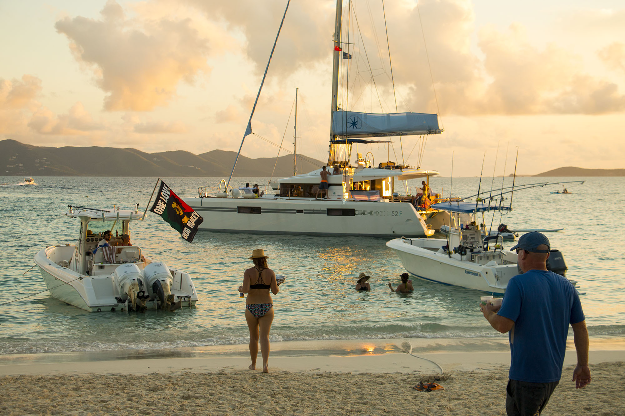 Busy Bay Some visitors take their last drinks down to their boat as they prepare to make the journey back home.