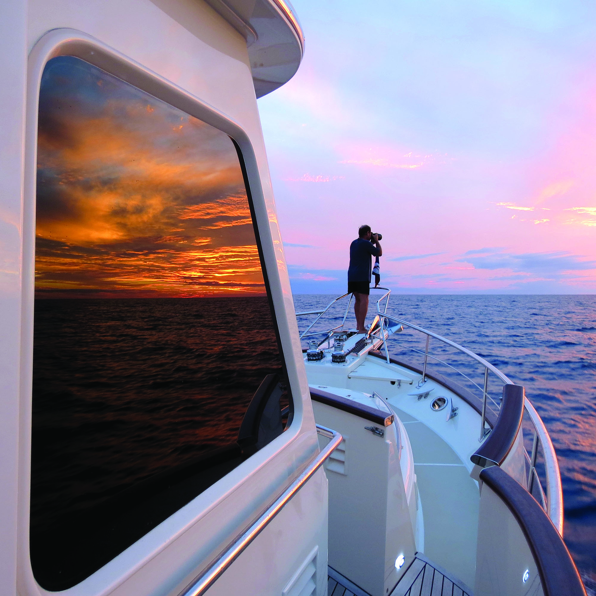 Blue Pearl This photo is from Denise and Don Bermant story on cruising in the Bahamas and in Cuba. It is often hard when you see and photograph boats regularly to come up with a unique and different photo. I really love how this photo does just that. Capturing both the view of the photo being taken as well as the warmth of the boat. It is a reminder of where a boat can take you and the special moments that exist there.