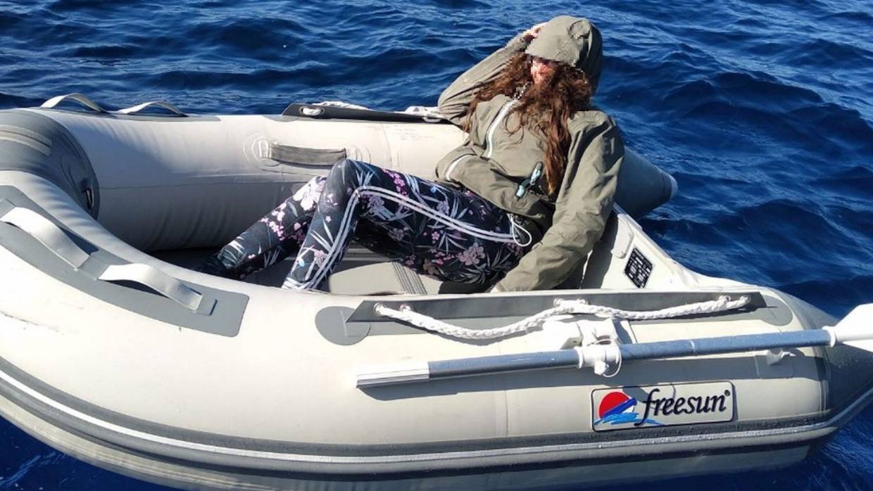 woman in dinghy
