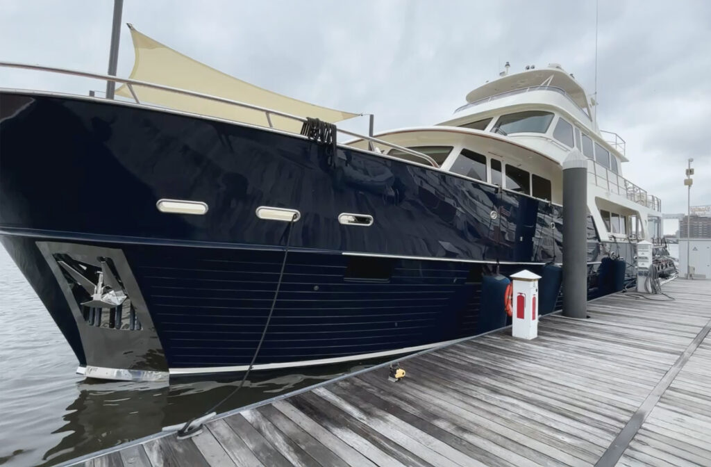 100-foot yacht at a dock