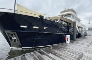 100-foot yacht at a dock