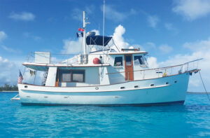 Kadey-Krogen 42 in profile on blue water