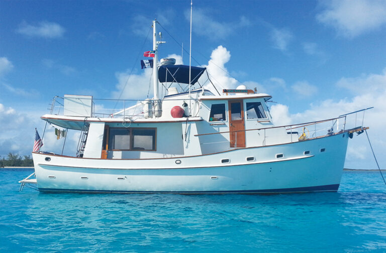 Kadey-Krogen 42 in profile on blue water