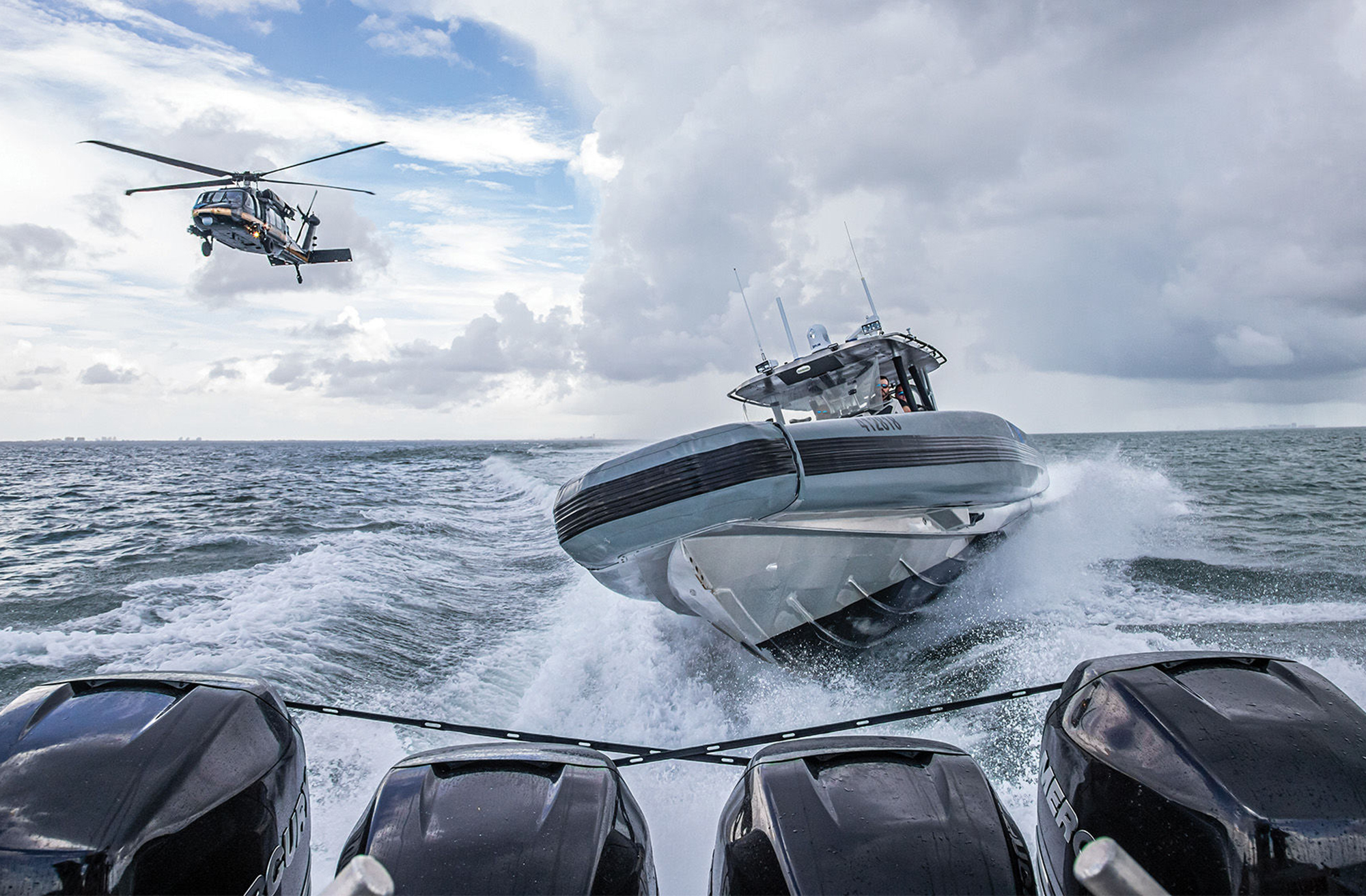 Homeland Security boat and helicopter