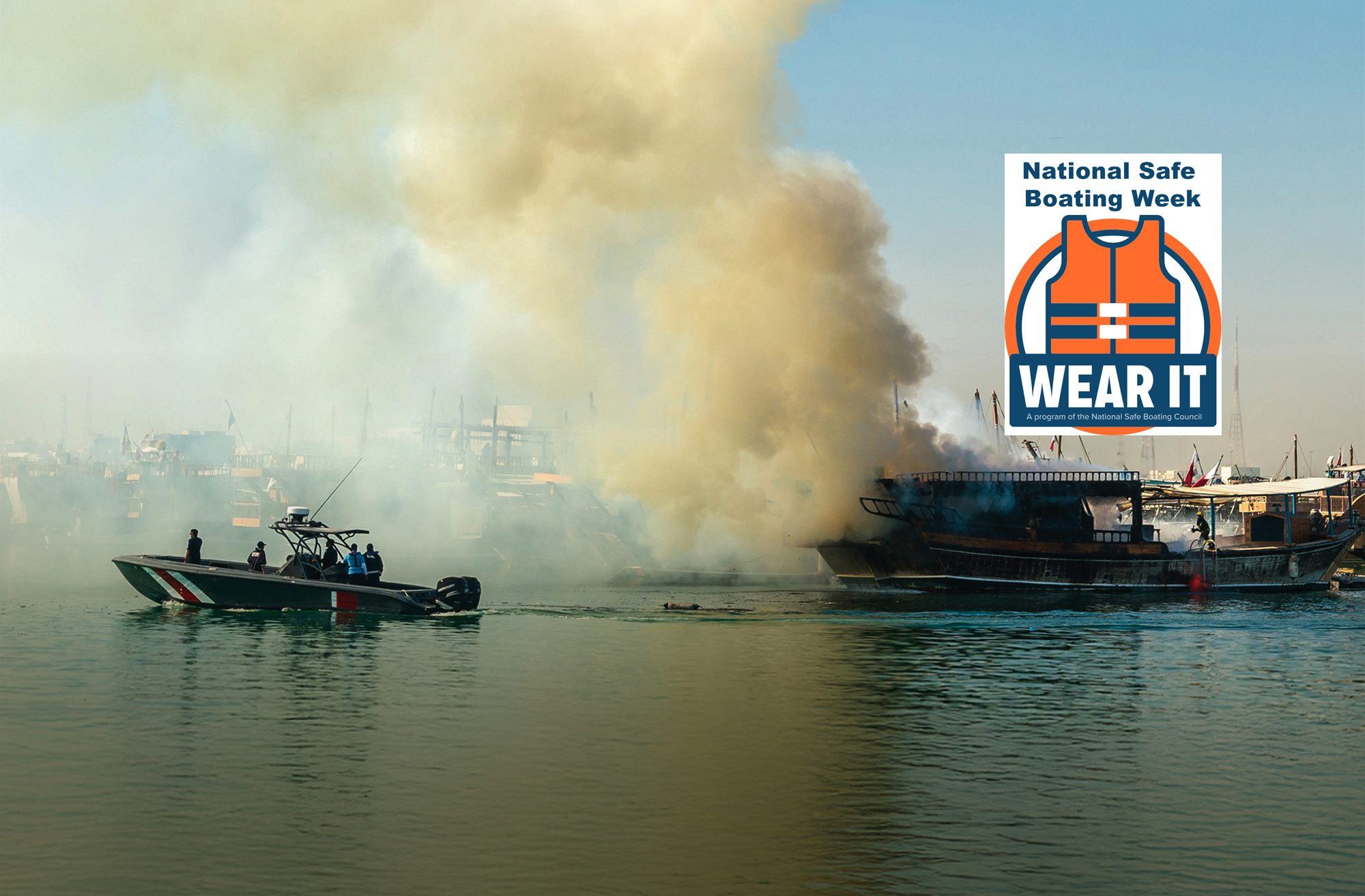 Traditional arabic dhow on fire in Doha, Qatar Boat on fire