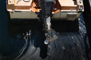 Fuel spill coming off transom of a boat