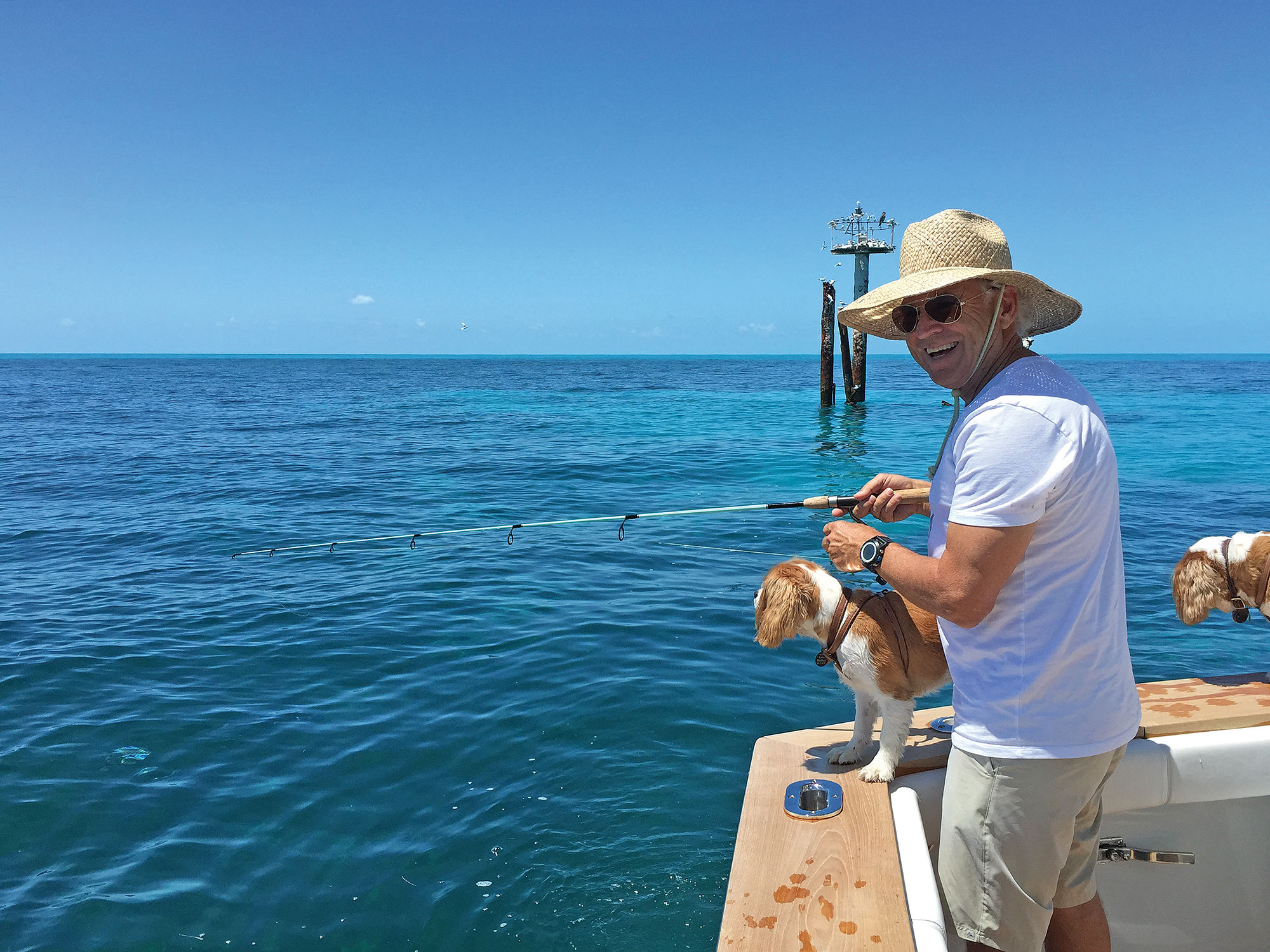 06-buffett-fishing-with-dogs