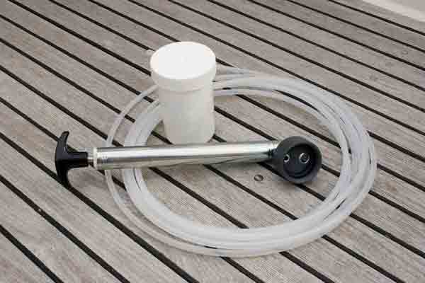 For do-it-yourselfers, this is all of the equipment needed to take an oil sample.