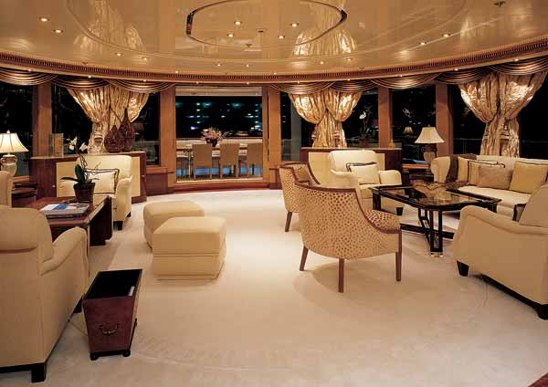 lurssen-linda-lou-g1.jpg promo image The curved wall of windows aft in the yacht's saloon make for drama day or night.