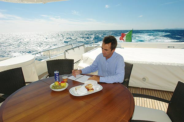The author tests the yacht’s stability using the old "can of beer" technique.
