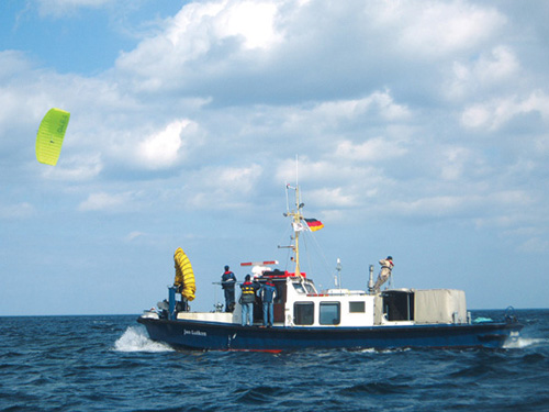 green-scene-g1.jpg promo image Photo Courtesy of SkysailsOnboard a comparatively small experimental vessel, Skysail techs deploy a towing kite of high-strength, weatherproof textiles for propulsion.