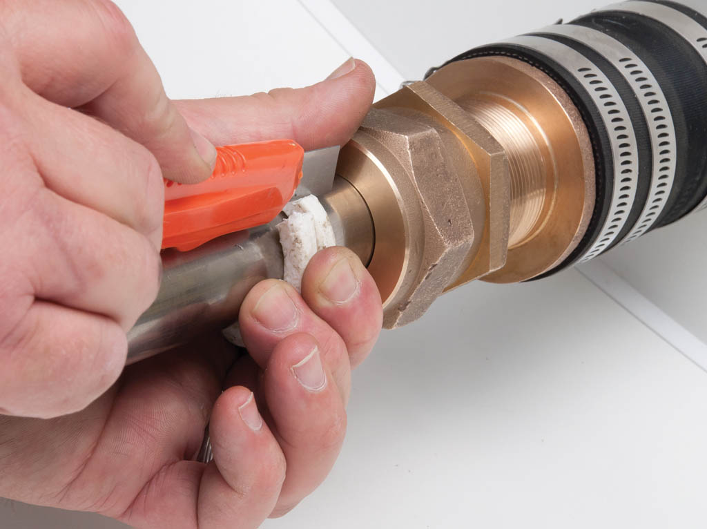Cut three rings of packing with a sharp utility knife.