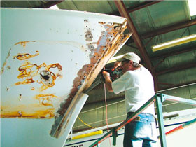 Repairing a boat at Oxford Boatyard, in Oxford, Maryland Repairing a boat at Oxford Boatyard, in Oxford, Maryland