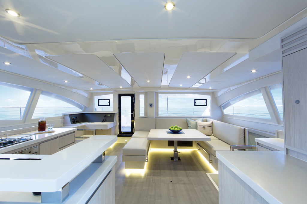 The saloon has a galley to port and a full dinette. But you won’t spend much time inside in the BVI. - click to enlarge