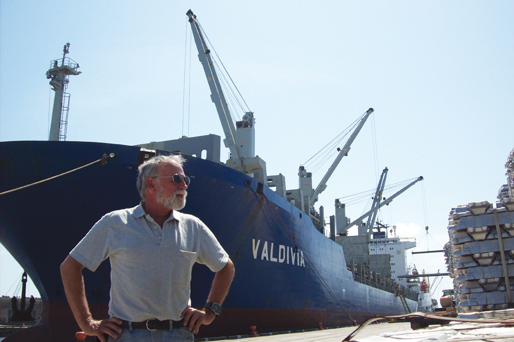 Capt Max Hardberger in front of a ship