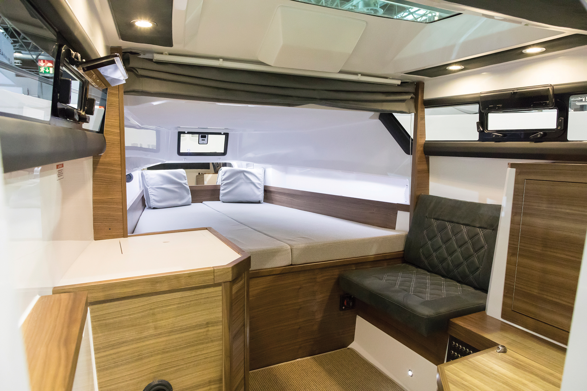 The 37 SC’s cabin is well suited for an overnight or a long weekend. A large hatch above the queen berth lets you stow gear below quickly and easily.