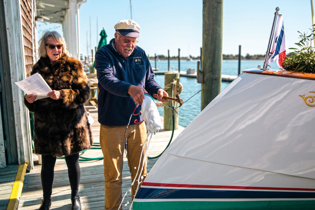 Jim and his third wife, Margaret Moores, christening his own design, Patience.