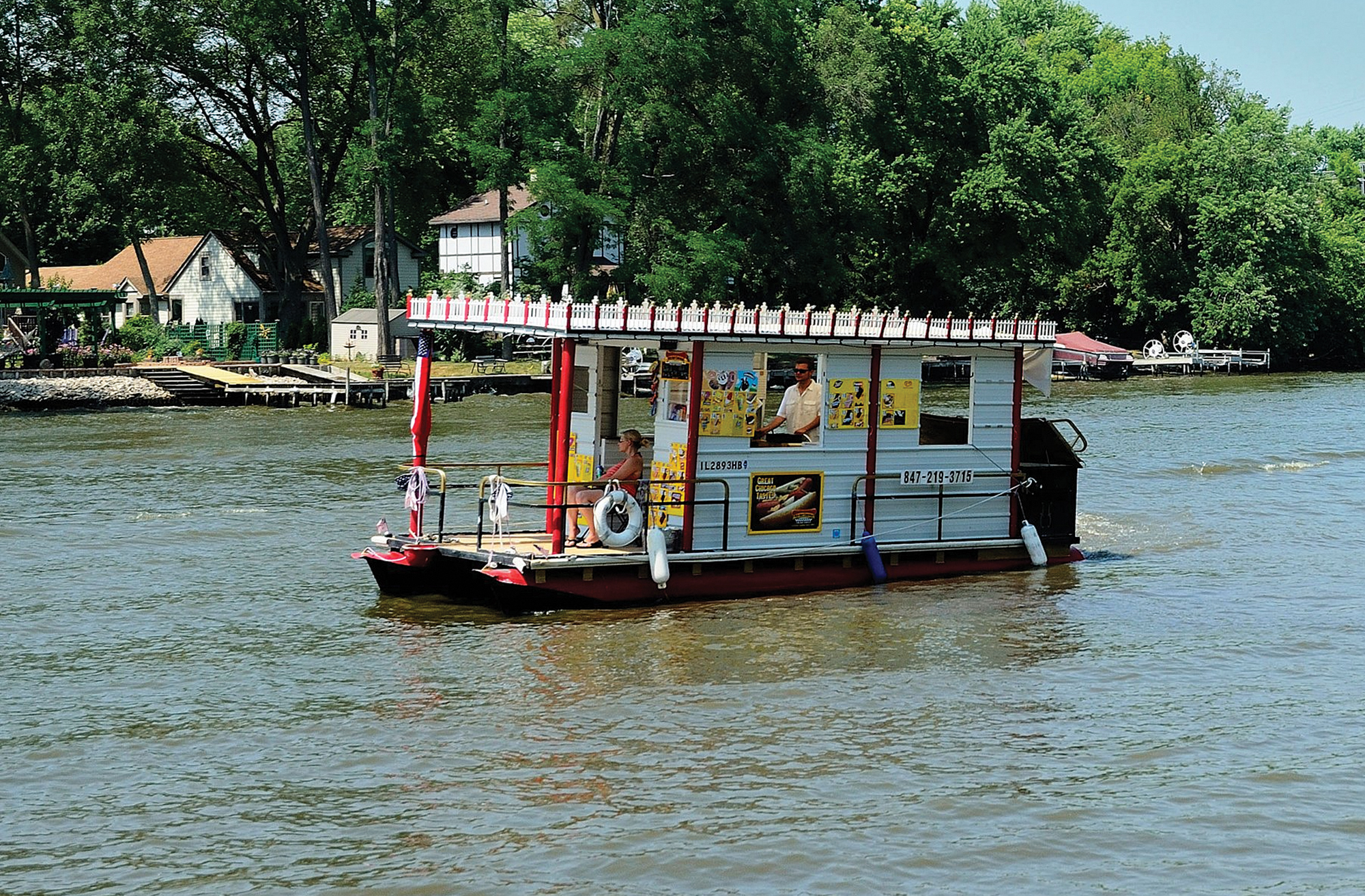 Concessions boat cruising the Fox River in Illinois, USA.