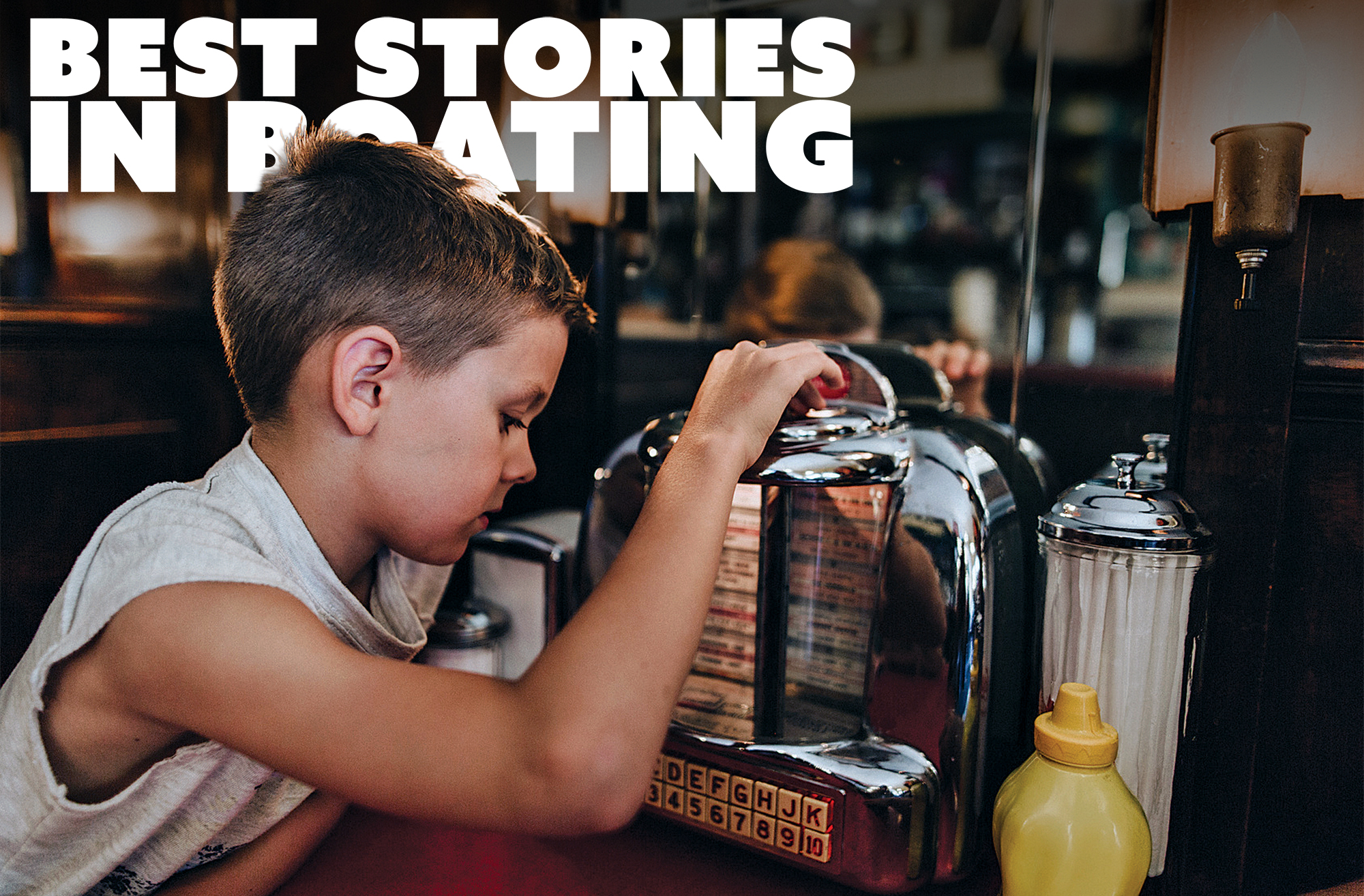 Boy in Diner looking at juebox
