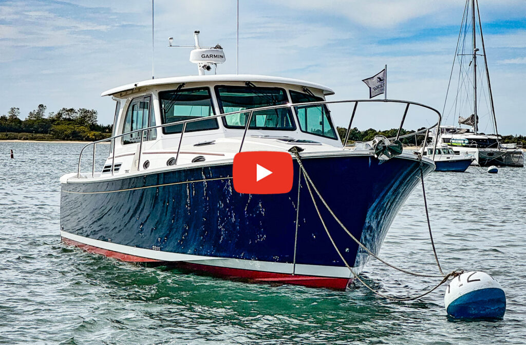 Back Cove 412 tied to a mooring