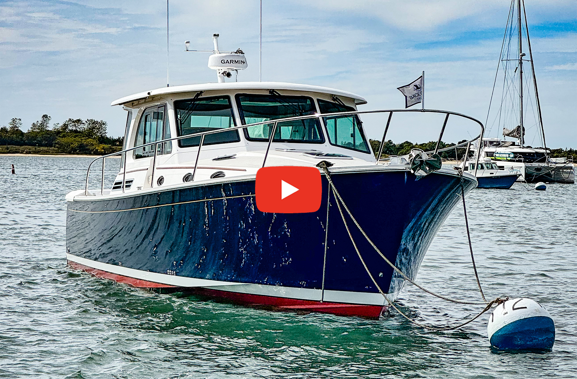 Back Cove 412 tied to a mooring