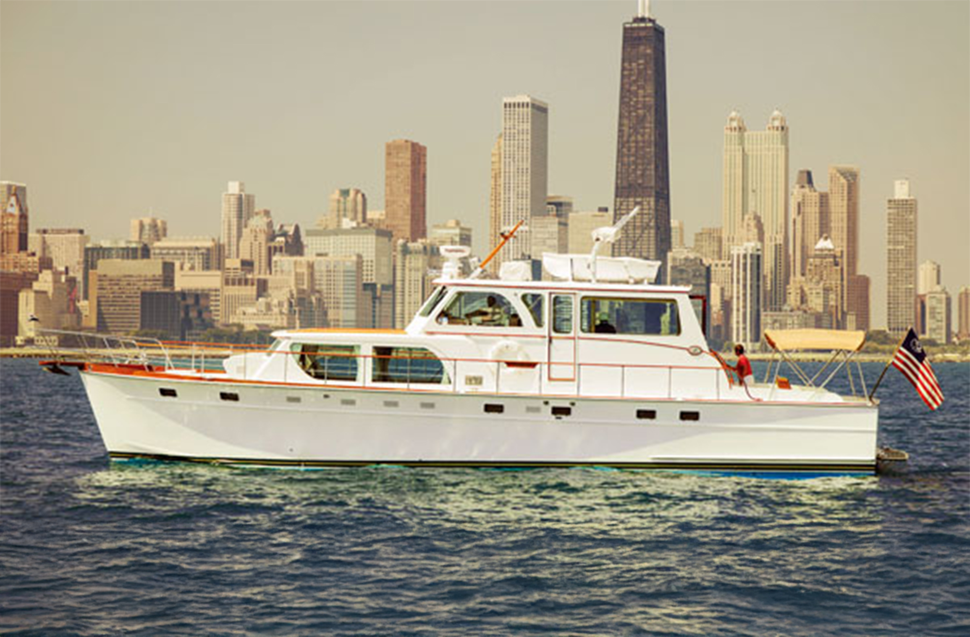 feat_huckins_55 Huckins 55 in profile with the Chicago skyline in the background