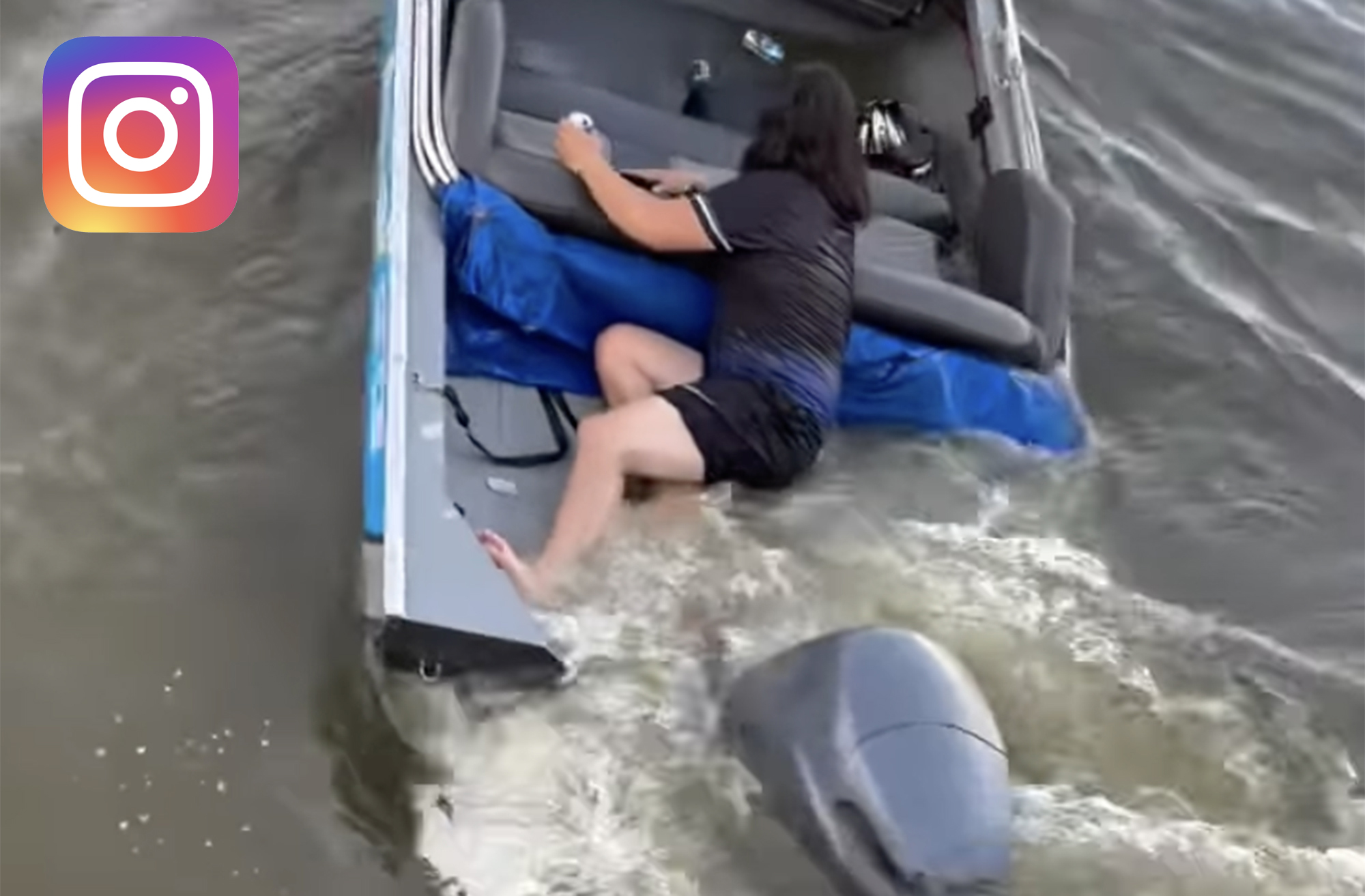 A woman in a flooded boat