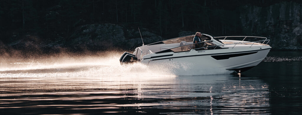outboard boat driving fast