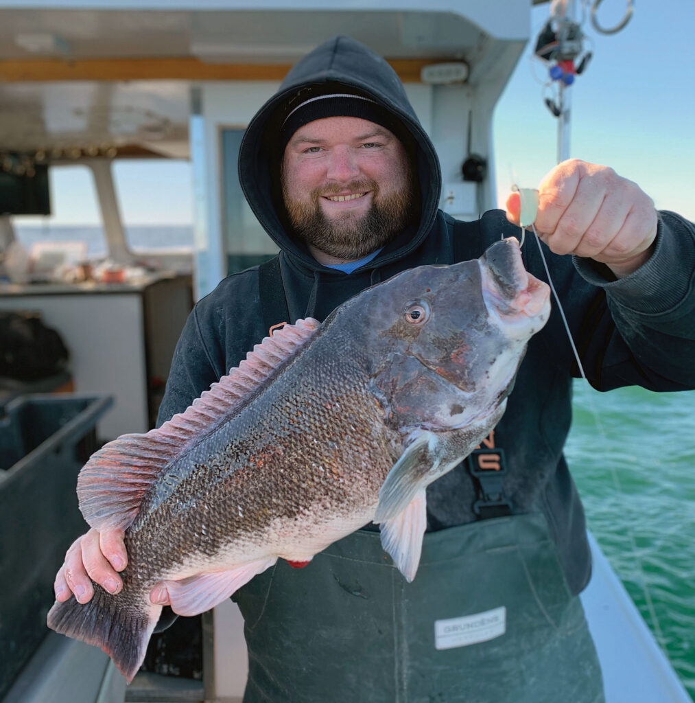 Capt. Jon Azato with a blackfish
