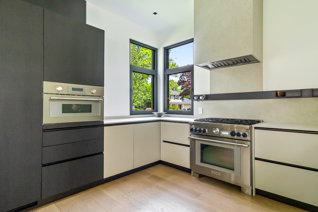 Modern kitchen with sleek cabinetry and stainless steel appliances