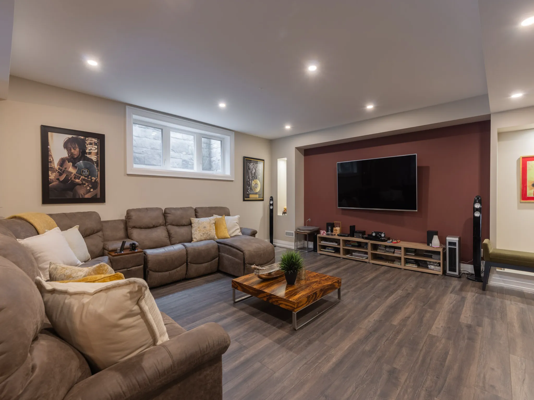 recreation room with big television and huge comfy couch
