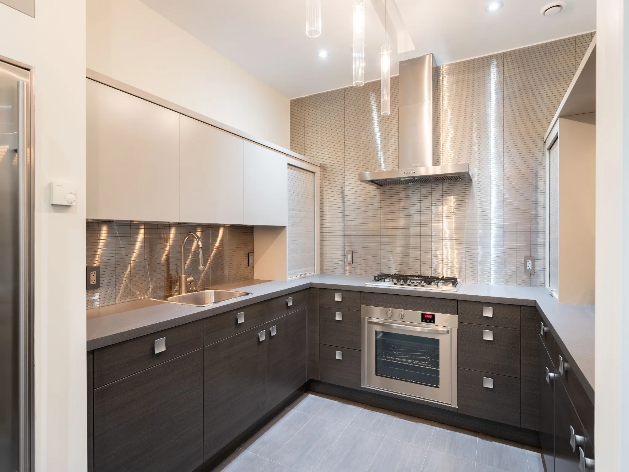 lower level kitchen area with stainless steel accents