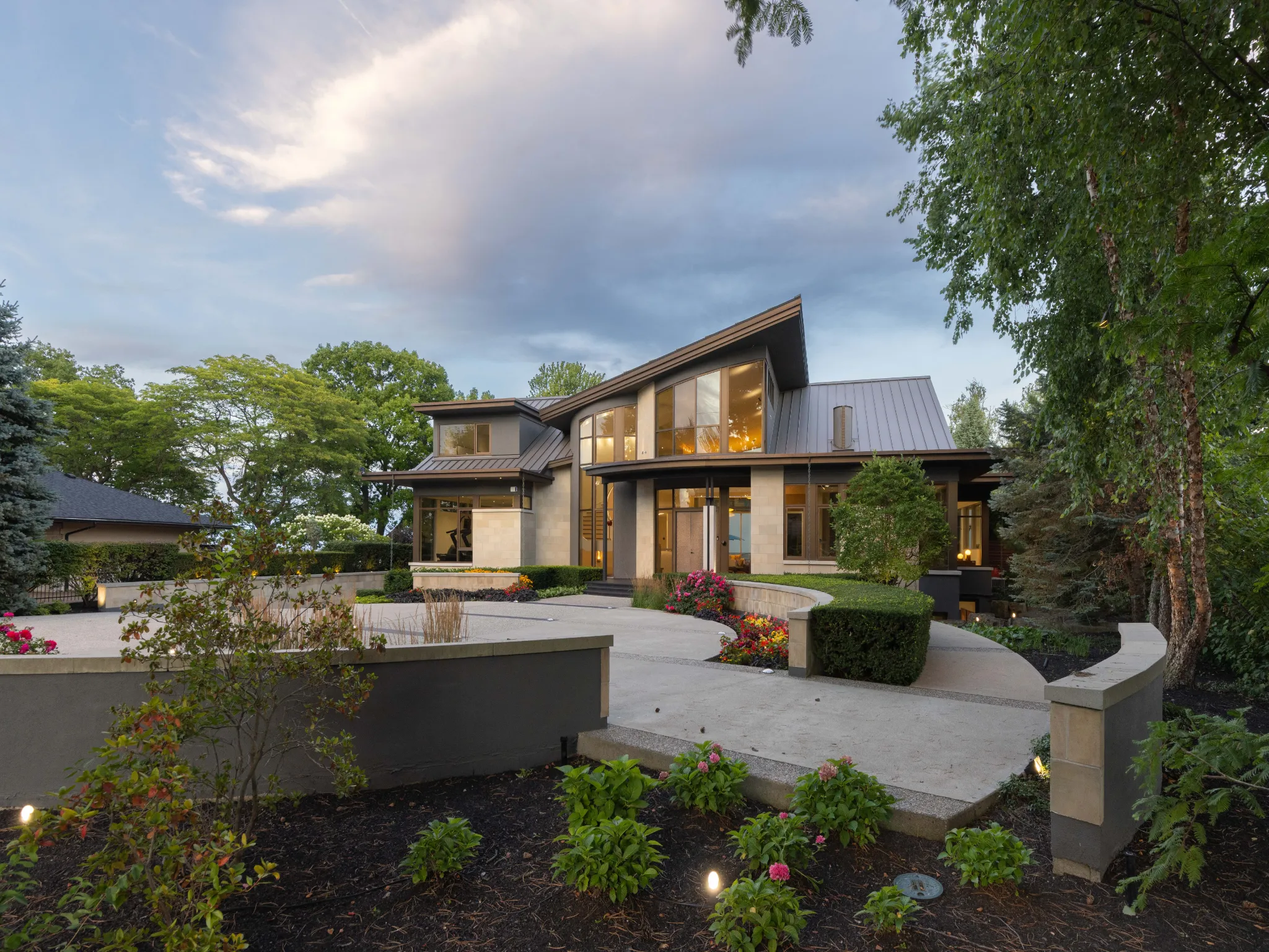 exterior of modern home with intricate lines and details, very luxurious