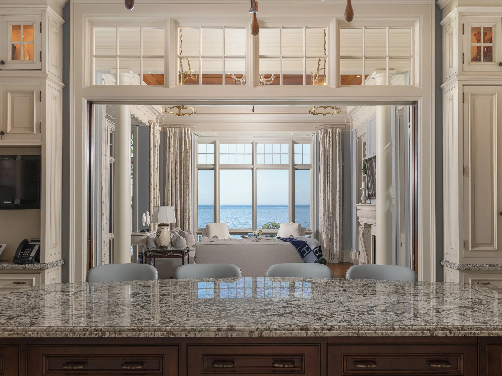 lake views from the kitchen island, fabulous transom windows allow for plenty of natural light