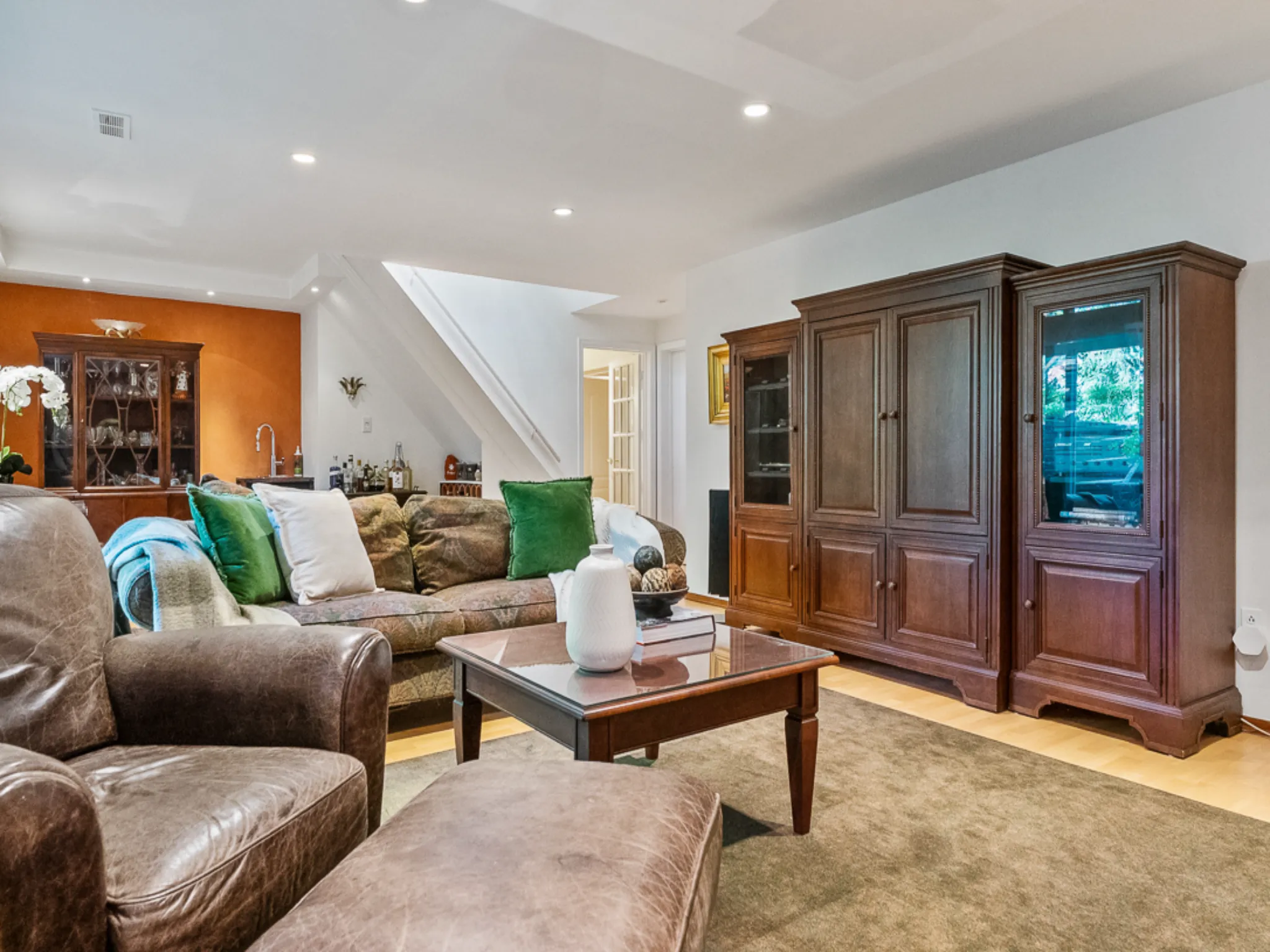 lower level with leather couches